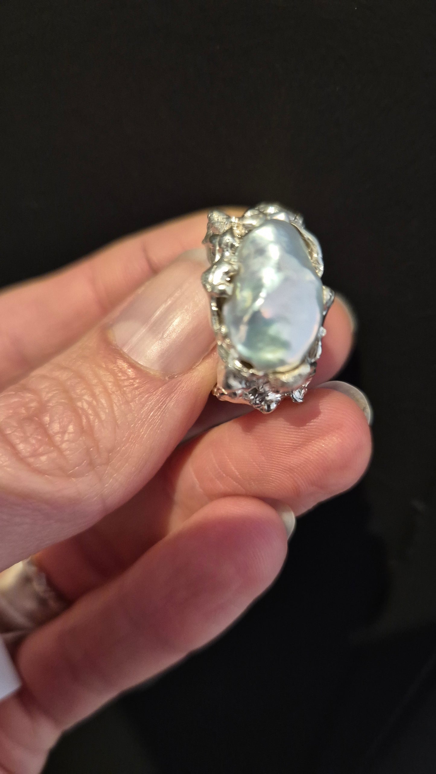 Sculptural sterling silver lava ring with grey peacock baroque pearl