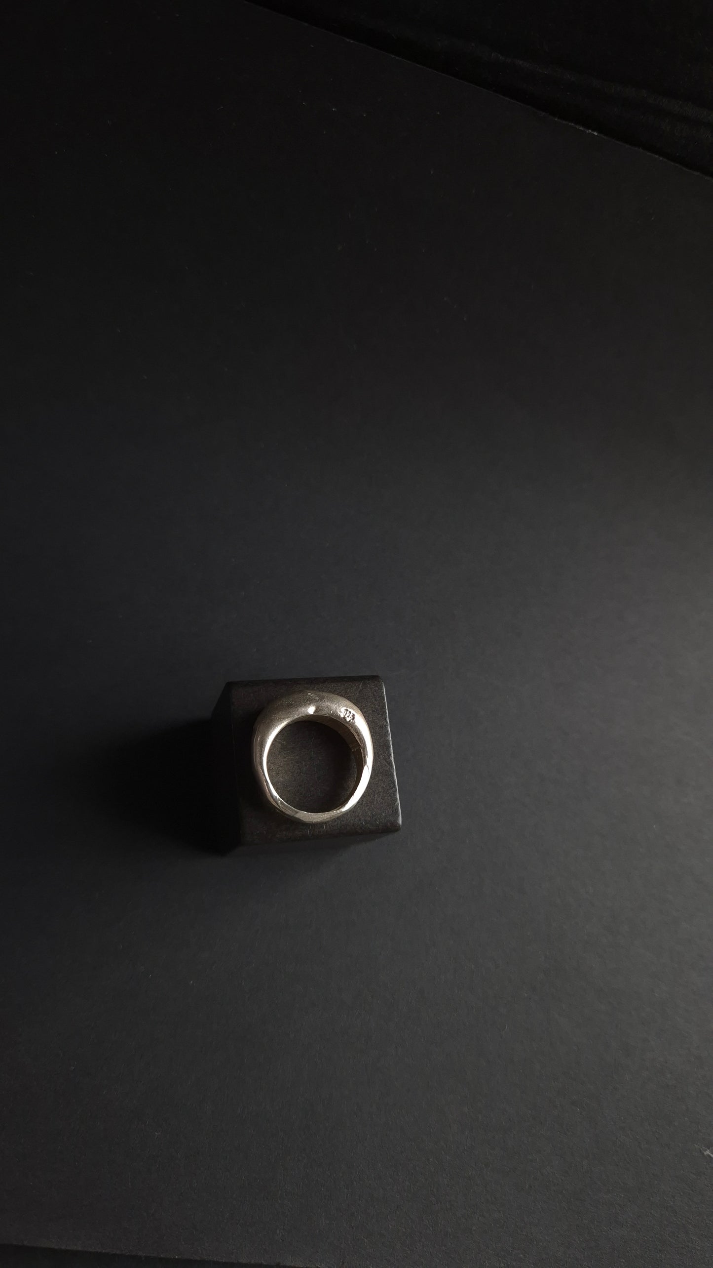 Hand-carved silver ring with molten, hammered and cut texture