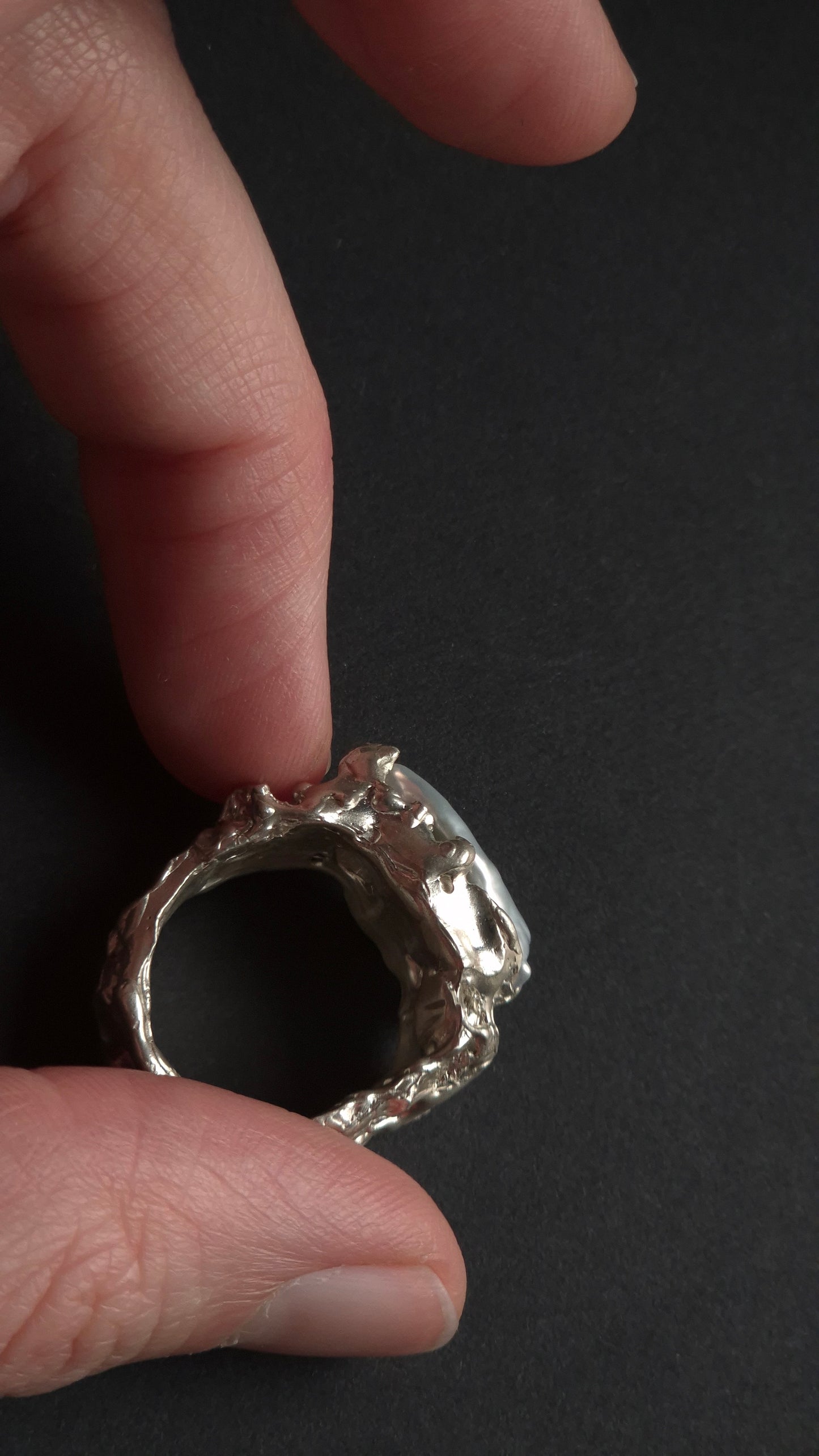 Sculptural sterling silver lava ring with grey peacock baroque pearl