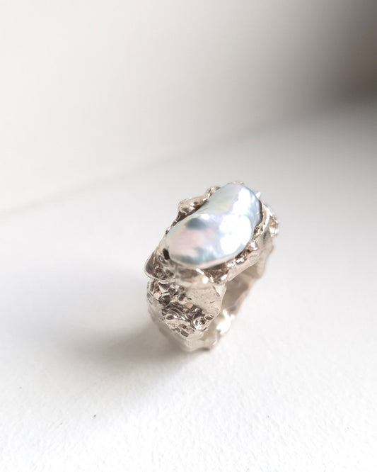 Sculptural sterling silver lava ring with grey peacock baroque pearl