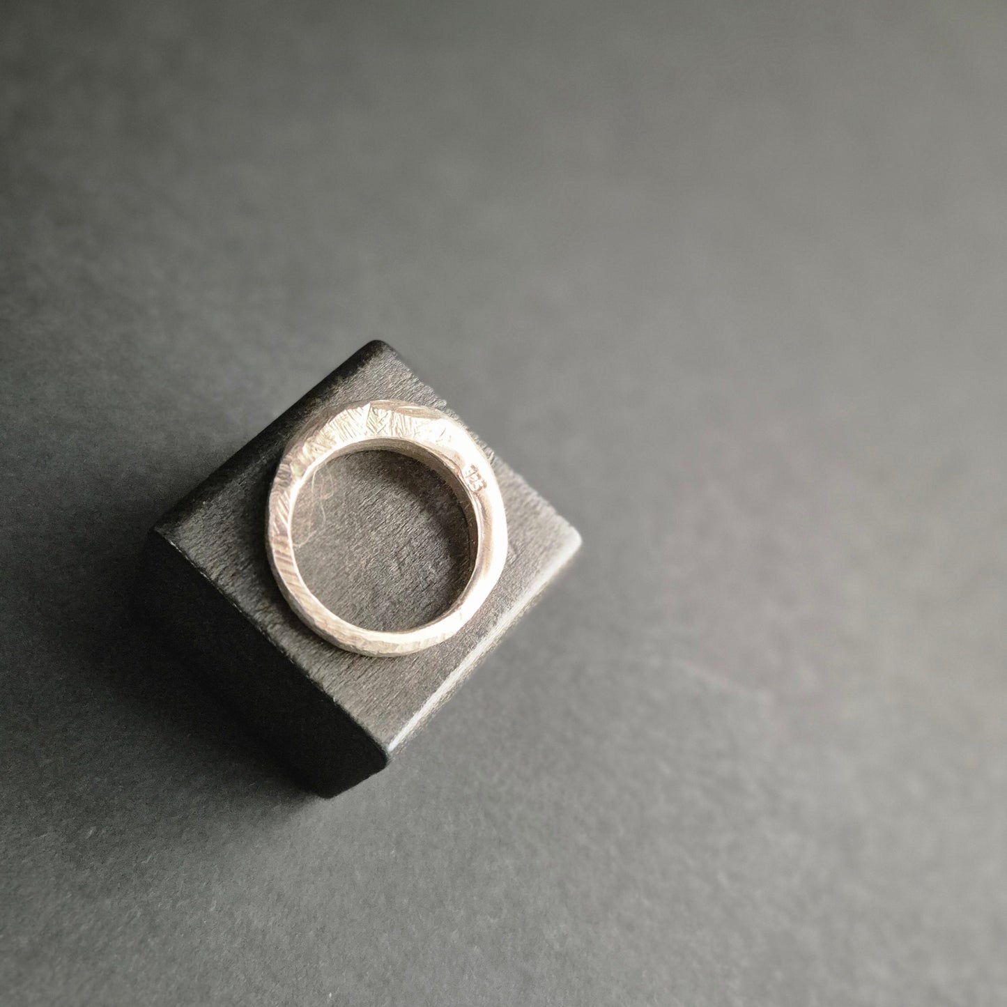 Hand-carved silver ring with hammered and filed finishing