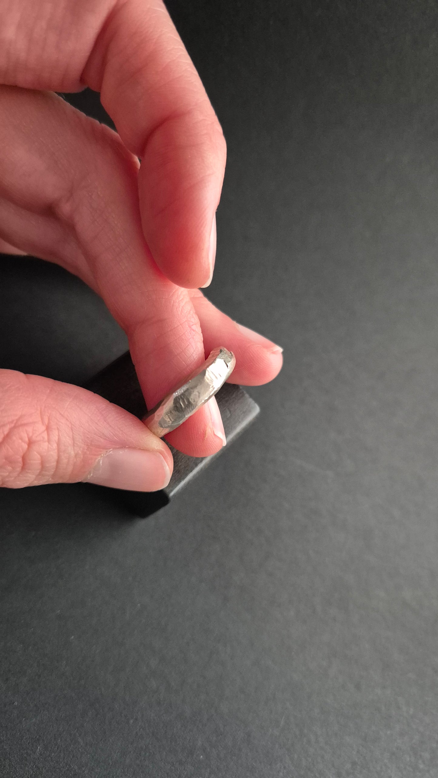 Hand-carved silver ring with hammered and filed finishing